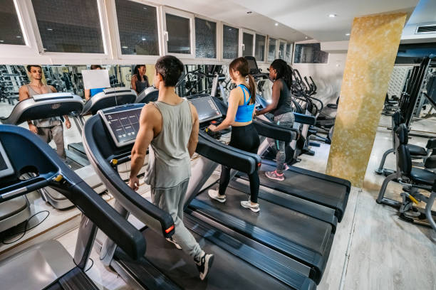 istock People running on treadmill in gym 1211789150