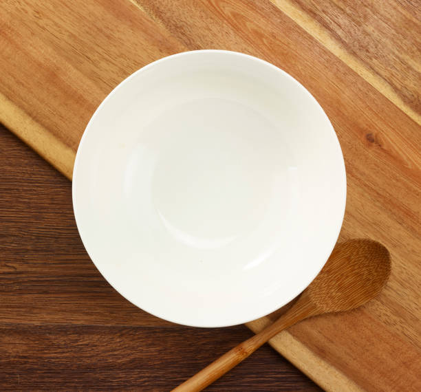 istock bowl on the wood background 1211791203
