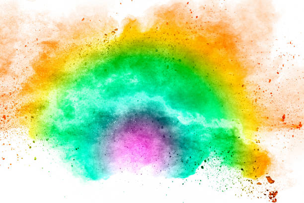 istock Abstract multi color powder explosion on white background.Freeze motion of dust particles splash. 1211792125