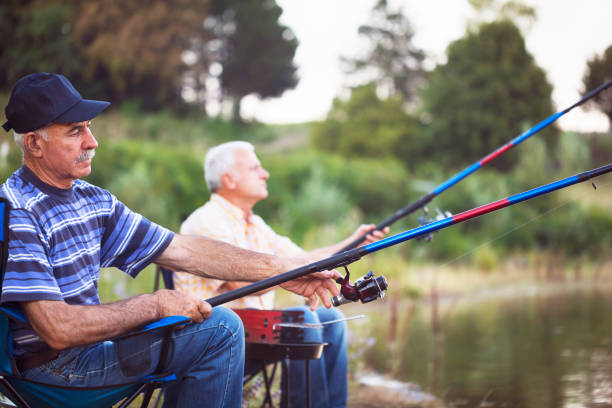 istock Two men relaxing and fishing 1211797211