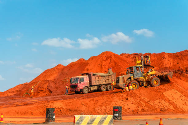 istock Road construction site with diggers and trucks,  Mozambique 1211800649