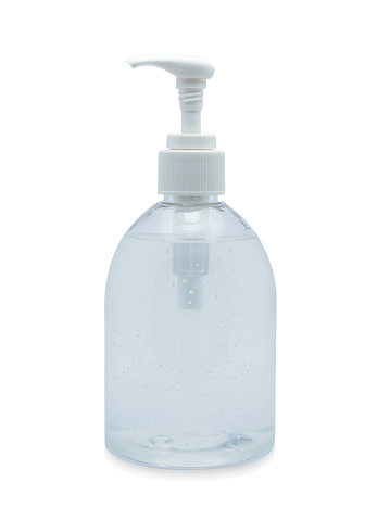 Hand disinfection in transparent plastic bottle pump with transparent liquid isolated on white background