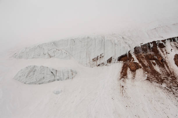 istock View at misty mountain sides covered in snow 1211807671