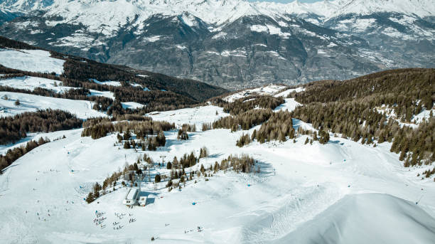 istock aerial view of ski slopes in day light 1211810253