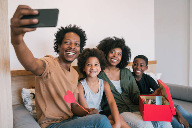 istock Family taking selfie with phone while celebrating Mother's day. 1211812879