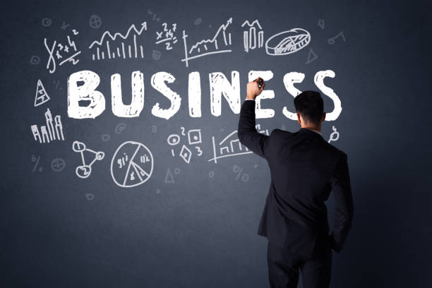 istock Businessman with business plan 1211814749
