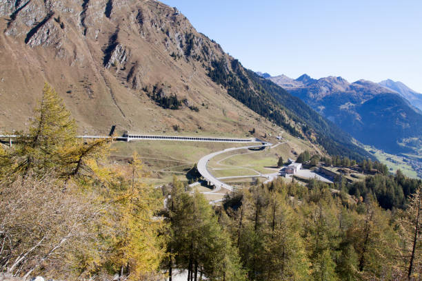 Road up to St Gotthard pass on southern side Road up to St Gotthard pass on southern side coming from Airolo gotthard pass stock pictures, royalty-free photos & images