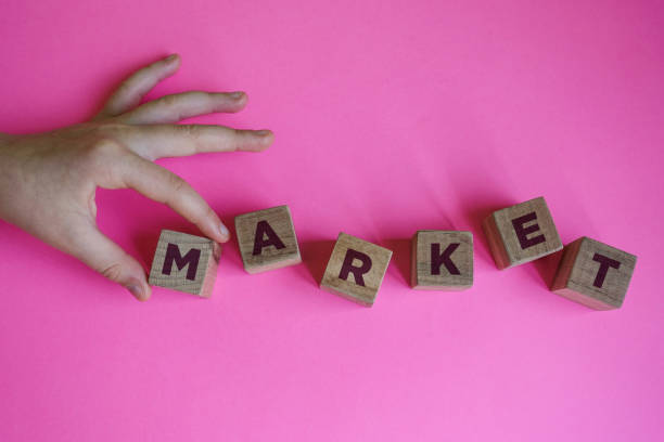 istock MARKET word made with building blocks. 1211816018