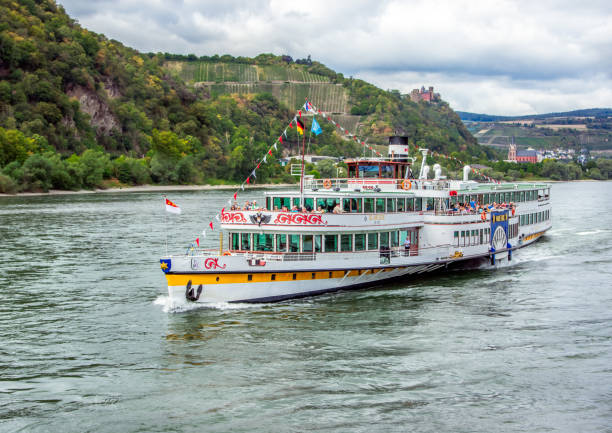 Kaub, Rhineland, Germany - 09/13/2019: Inland, Passenger Ship on the river Rhine, a historic paddle steamer RMS Goethe.