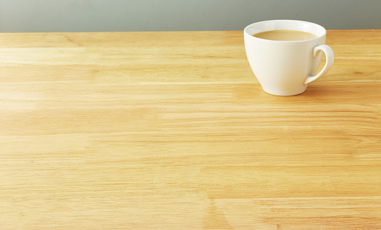 a cup on the wood background