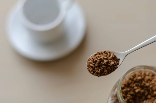 istock A full spoon of instant coffee close-up. 1211825441