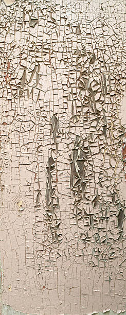 flaking paint on an old wooden board stock photo