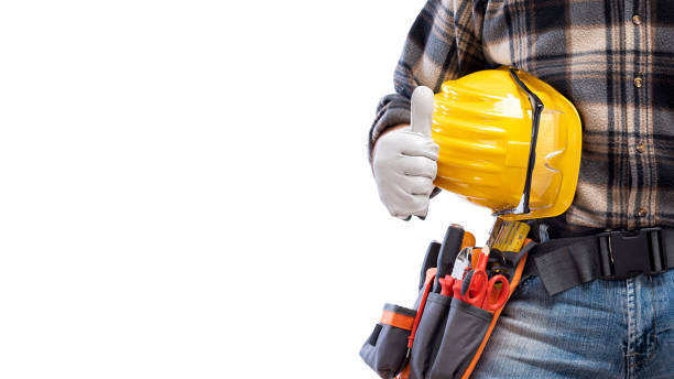 istock Electrician with tool belt on a white background. Electricity. 1211833984