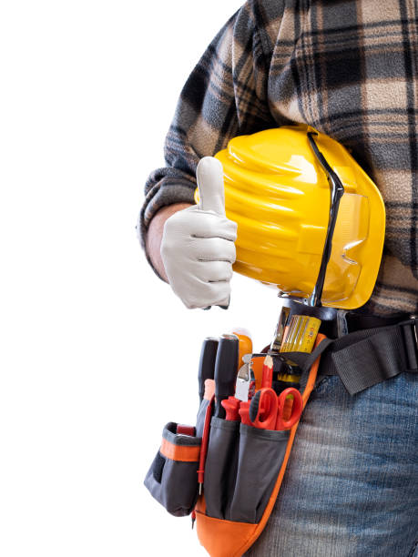 istock Electrician with tool belt on a white background. Electricity. 1211833987