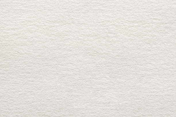 istock beige grainy kraft cardboard textured background 1211837303