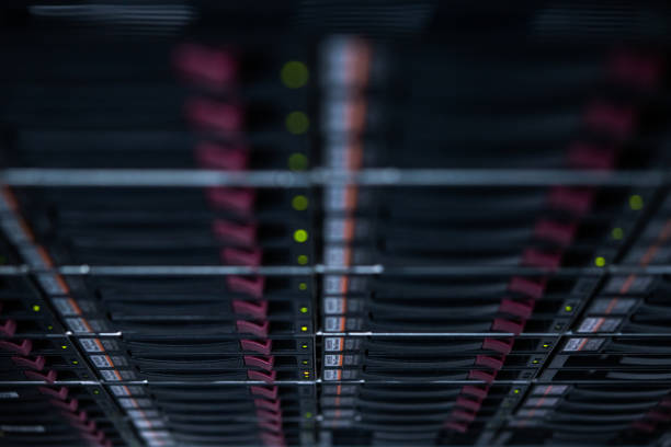 hard disks on the storage system mounted in rack in data center - network server rack computer black imagens e fotografias de stock