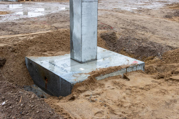 istock some Concrete columns for a factory building are erected on a large construction site 1211842213
