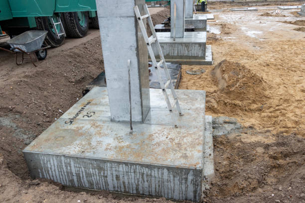istock some Concrete columns for a factory building are erected on a large construction site 1211842217