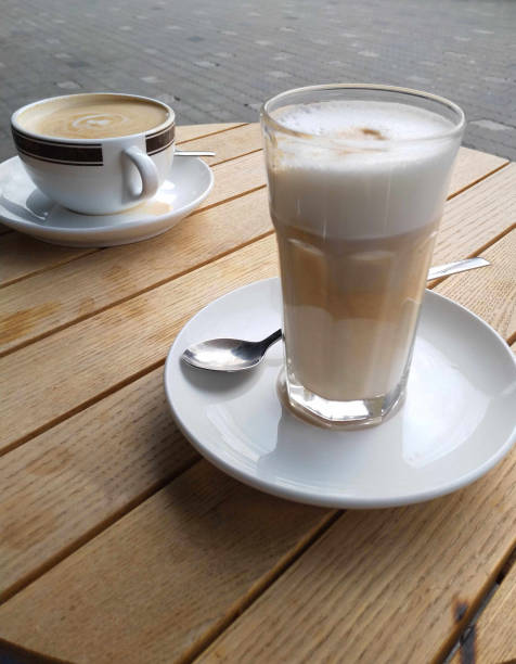 istock Latte macchiato and one cappuccino 1211843077