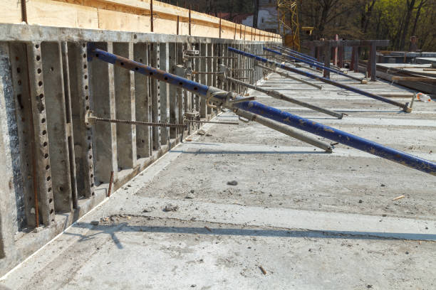 istock Construction of a new building, binding of reinforcement 1211844814