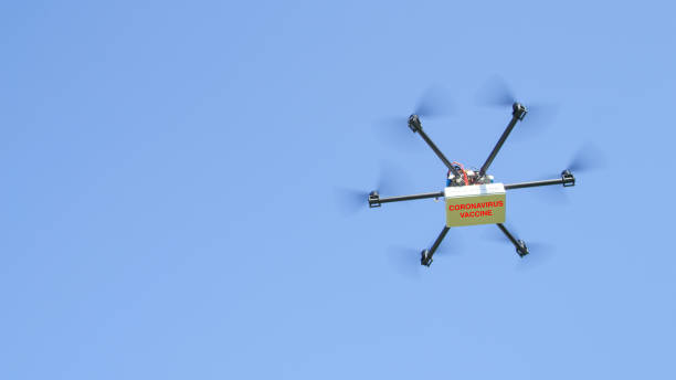 istock COPY SPACE: Heli delivery drone brings coronavirus vaccine to a quarantine. 1211847774
