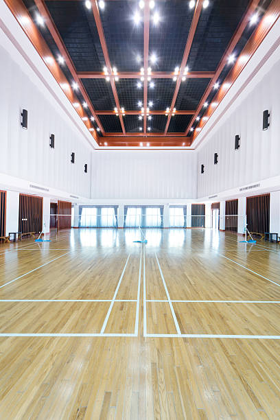 istock A empty sports court with white walls 121184786