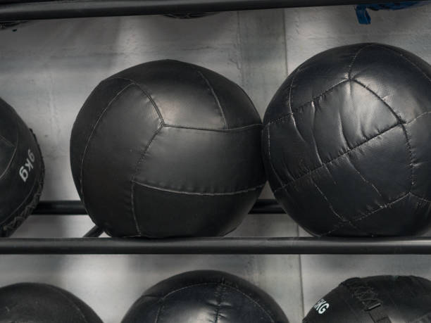 istock Black heavy balls in a gym 1211851478