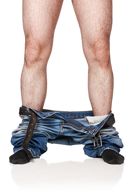 istock Nude man's legs on a white background 121185200