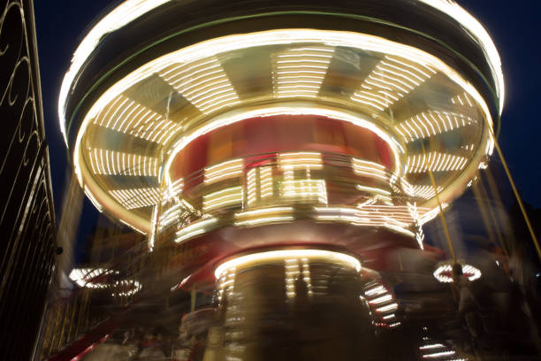 istock Carousel attraction in the night city. 1211856967