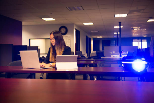 istock Presenters Using Digital Devices at their Office Meeting 1211858758