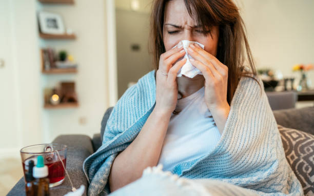istock Sick woman with flu 1211862624