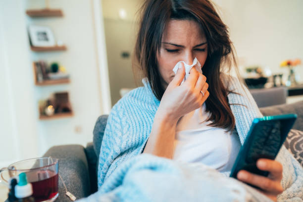 istock Sick woman with flu 1211862626