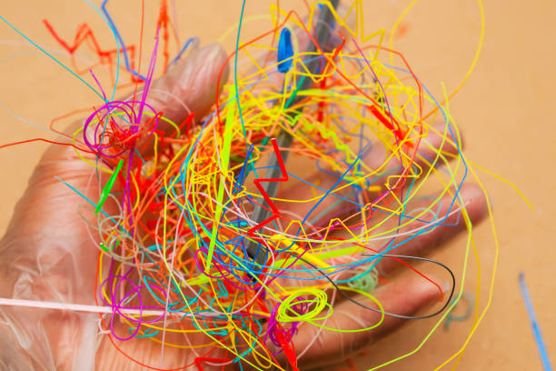 istock A handful of 3d printer filament and failed prints waste to be recycled. 1211863074