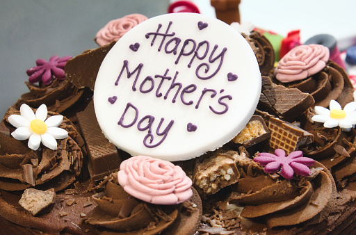 istock Happy Mother's Day cake with chocolate and marzipan icing 1211863775