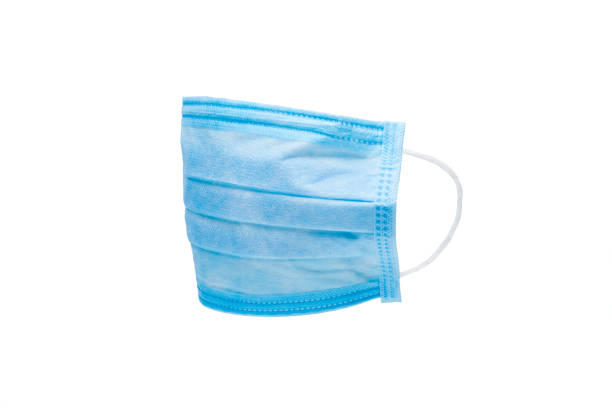 istock blue fabric sick mask side view isolated on white background. 1211863937