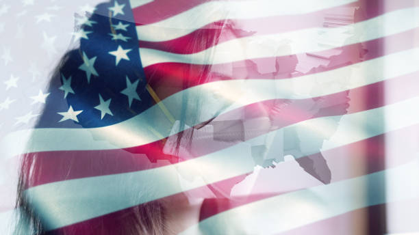istock Coronavirus 2019-nCov novel coronavirus concept motion background, patience with protective mask and USA flag overlay. 1211866055