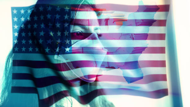 istock Coronavirus 2019-nCov novel coronavirus concept motion background, patience with protective mask and USA flag overlay. 1211866112