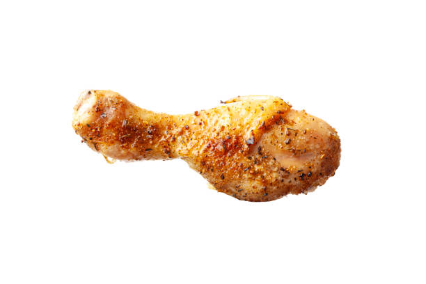 istock Baked chicken leg isolated on white background 1211866155