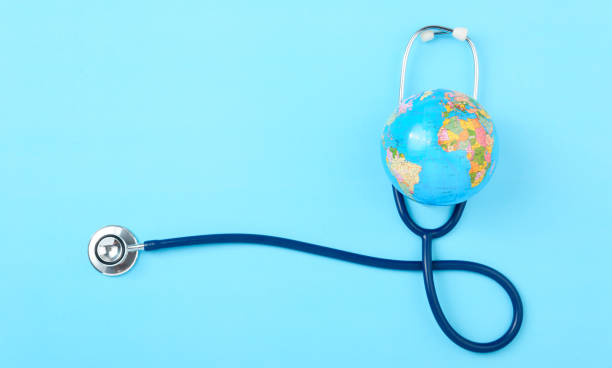 istock World health day concept, Stethoscope, globe on blue background 1211868100