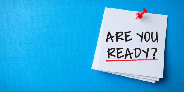 istock White Sticky Note With Are You Ready And Red Push Pin On Blue Background 1211870612