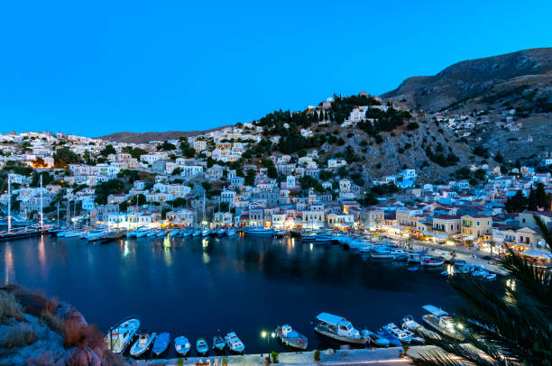 istock View over harbour at dusk Symi Town 1211872047