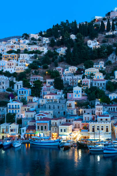 istock View over harbour at dusk Symi Town 1211872048