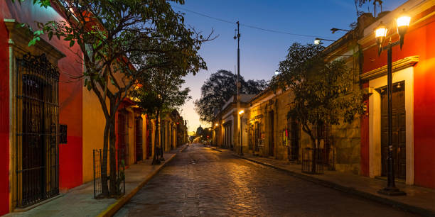 Oaxaca Cityscape at Sunrise, Mexico Panorama cityscape of Oaxaca city at sunrise with its colonial style architecture, Oaxaca state, Mexico. oaxaca city photos stock pictures, royalty-free photos & images