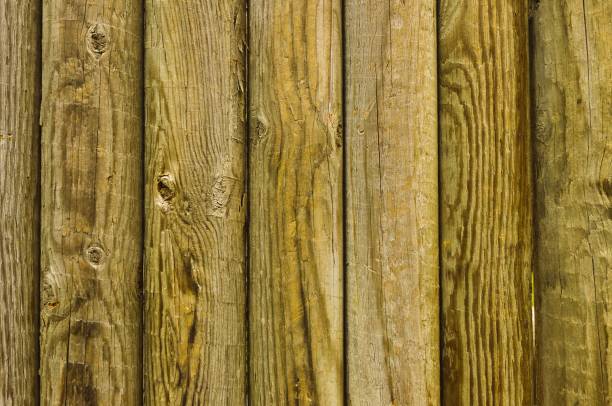 istock Wood grain of rough hewn log boards 1211887407