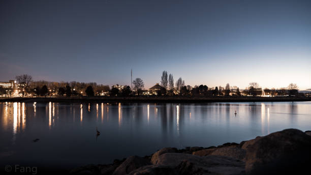 istock Lake Shore in City 1211892661