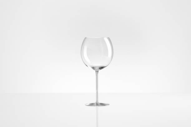 istock Empty wine glass on white background with clipping path 1211895504