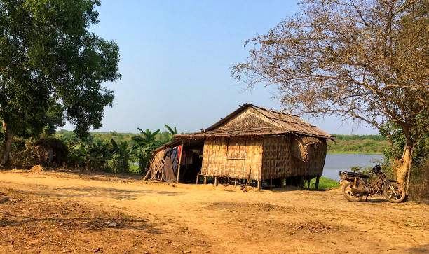 istock Thatched Hut and Bike Myanmar 1211898368