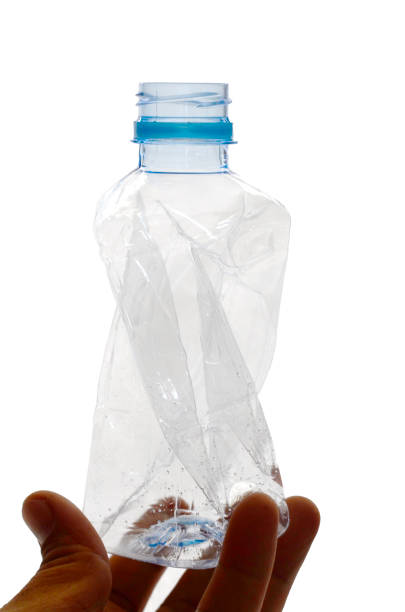 istock crumpled small plastic water bottle on white background 1211899134