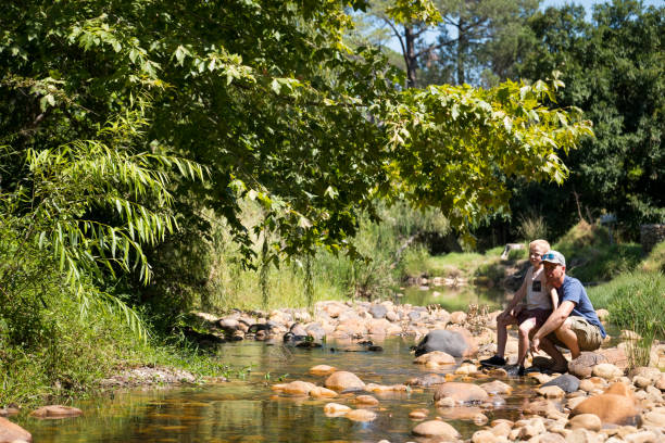 istock Father teaching his son about sustainability and nature 1211900839