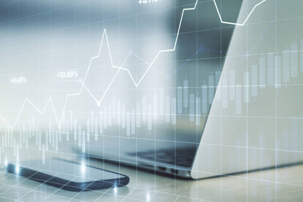 istock Abstract creative financial graph on modern laptop background, forex and investment concept. Multiexposure 1211908336
